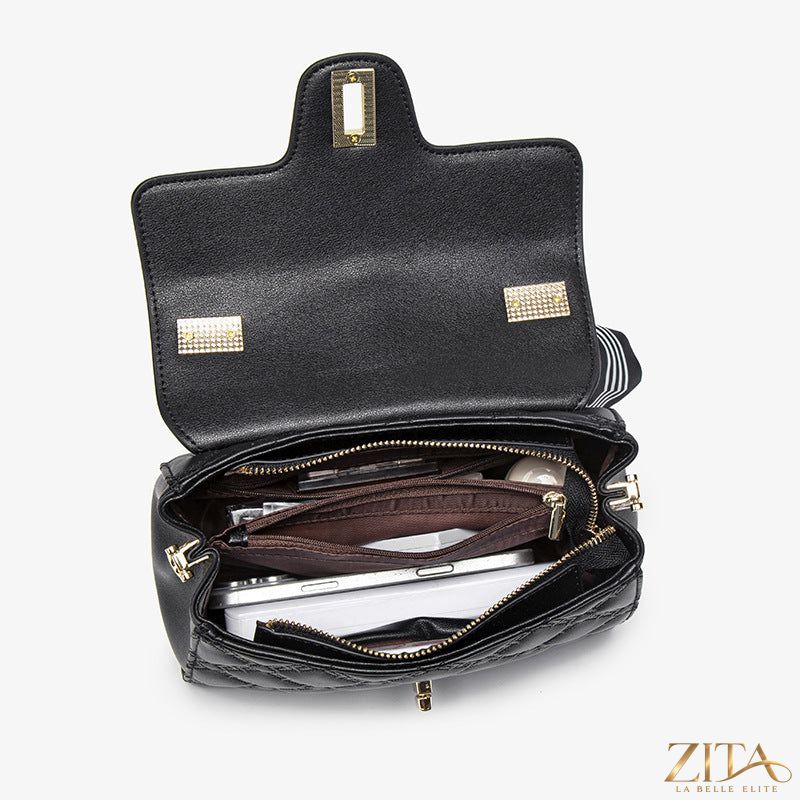 Trendsi quilted leather crossbody bag with adjustable strap, featuring a sleek design and gold-tone hardware.