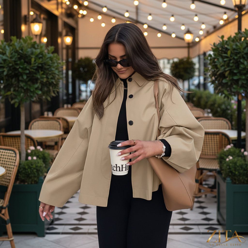 Women's French-style loose mid-length trench coat by Zita La Belle Elite, shown in a chic workwear look.
