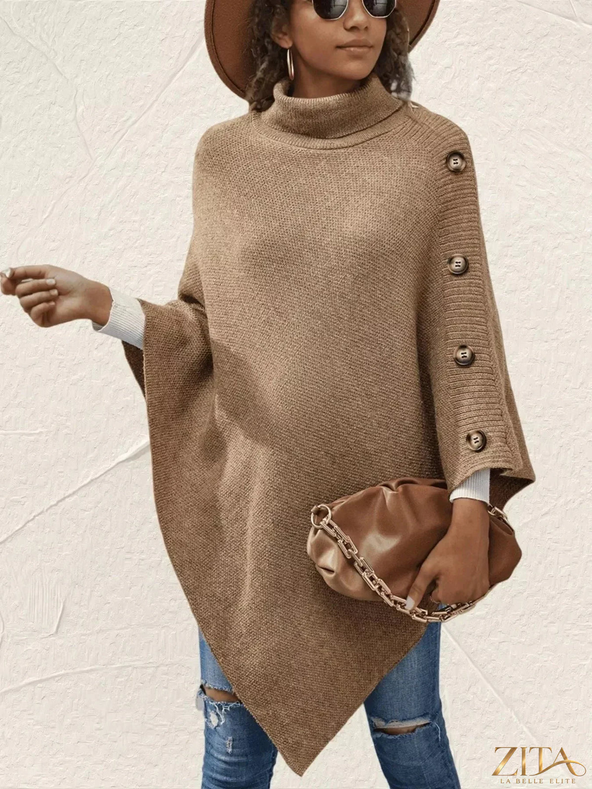 Zita La Belle Elite button-decor turtleneck poncho pullover in cozy knit fabric, featuring decorative buttons and a relaxed fit.