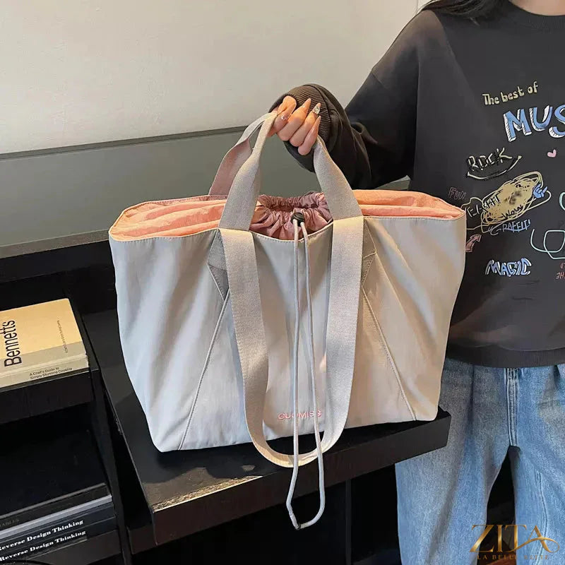 Lightweight Zita La Belle Elite large capacity travel tote bag with sturdy handles and spacious interior for carry-on travel needs.