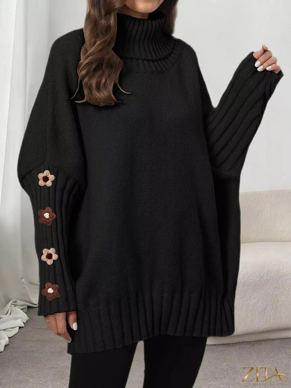 Zita La Belle Elite oversized turtleneck sweater with floral applique sleeves, cozy knit, and stylish design.