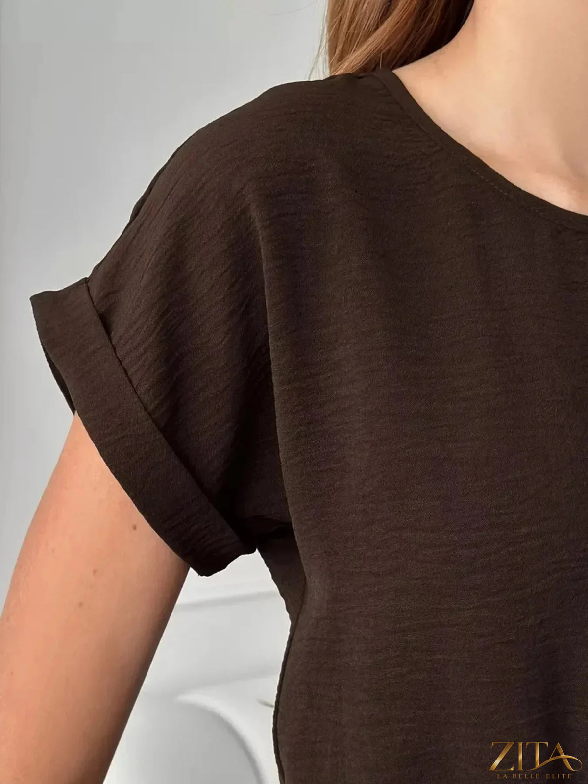 Zita La Belle Elite casual midi dress with drawstring waist, sleeveless design, lightweight fabric, and relaxed fit.