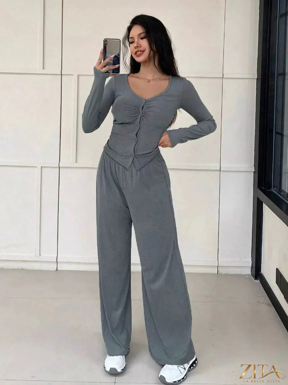Zita La Belle Elite button-down top and wide-leg pants set in a stylish, coordinated outfit, featuring a classic collar and flowing fabric.