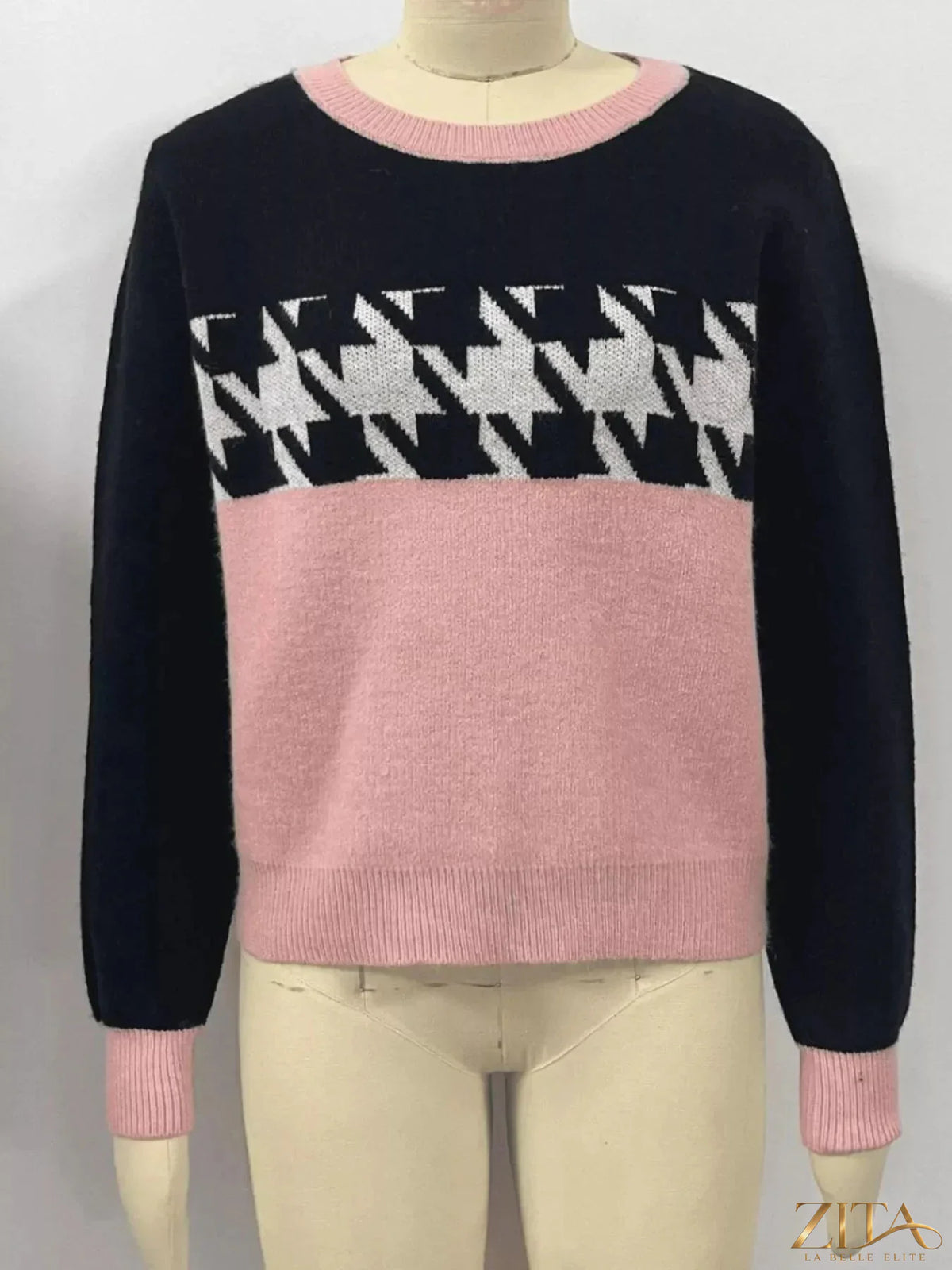Color block houndstooth sweater by Trendsi featuring a stylish knit design with bold color blocks and classic houndstooth pattern.