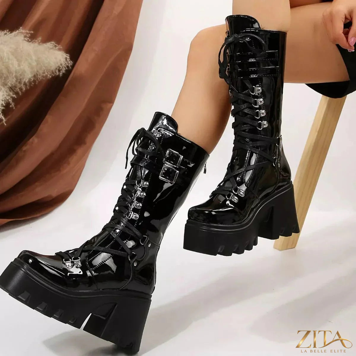 Black lace-up platform boots by Trendsi featuring chunky soles and stylish design, perfect for edgy fashion looks.