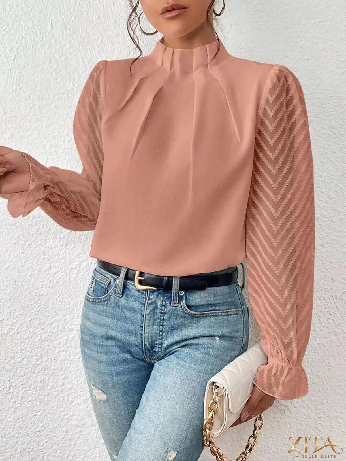 Zita La Belle Elite mock neck sheer lace sleeve blouse featuring delicate lace details and a fitted silhouette.