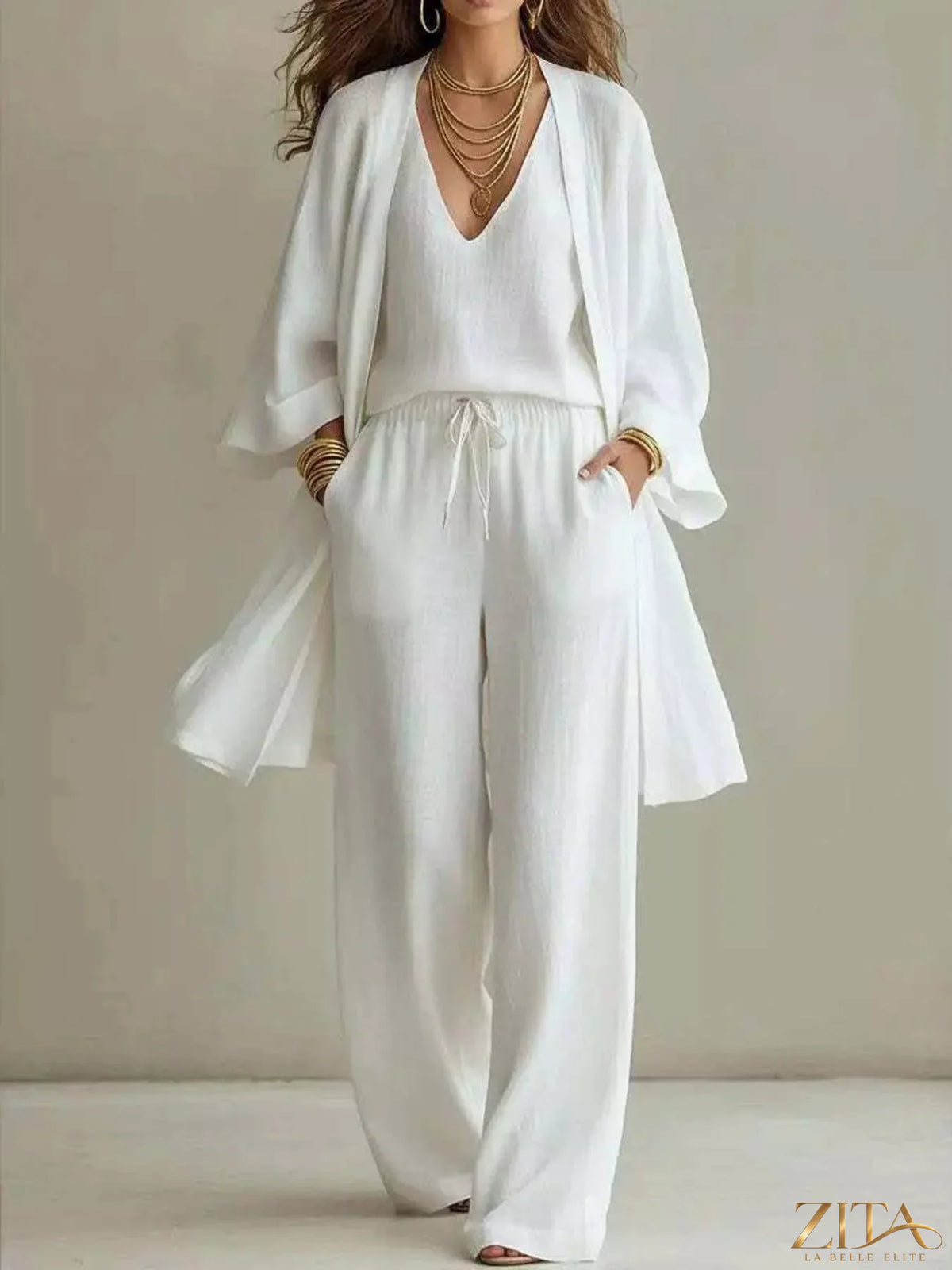 Zita La Belle Elite V-neck top, cardigan, and pants three-piece set, featuring a coordinated stylish outfit in a natural indoor setting.