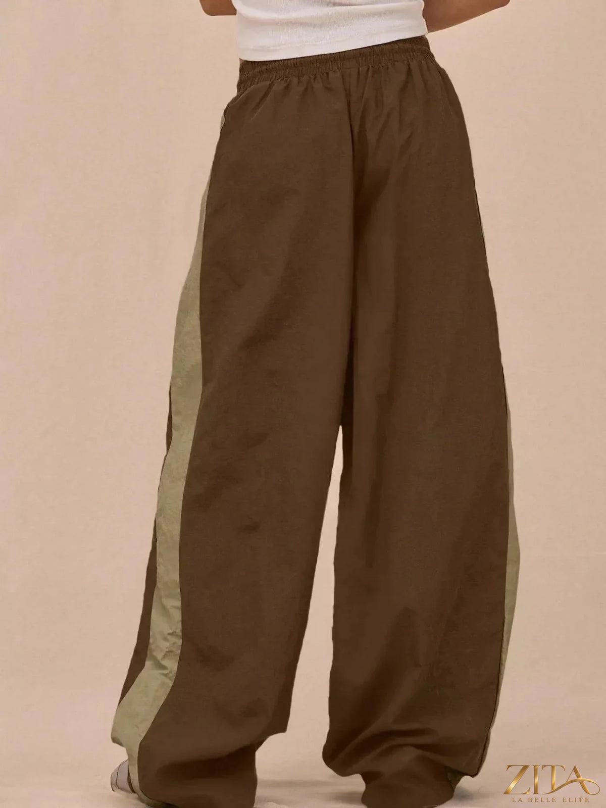 Color-block Zita La Belle Elite tracksuit and wide-leg pants set, featuring bold color panels and a comfortable fit.