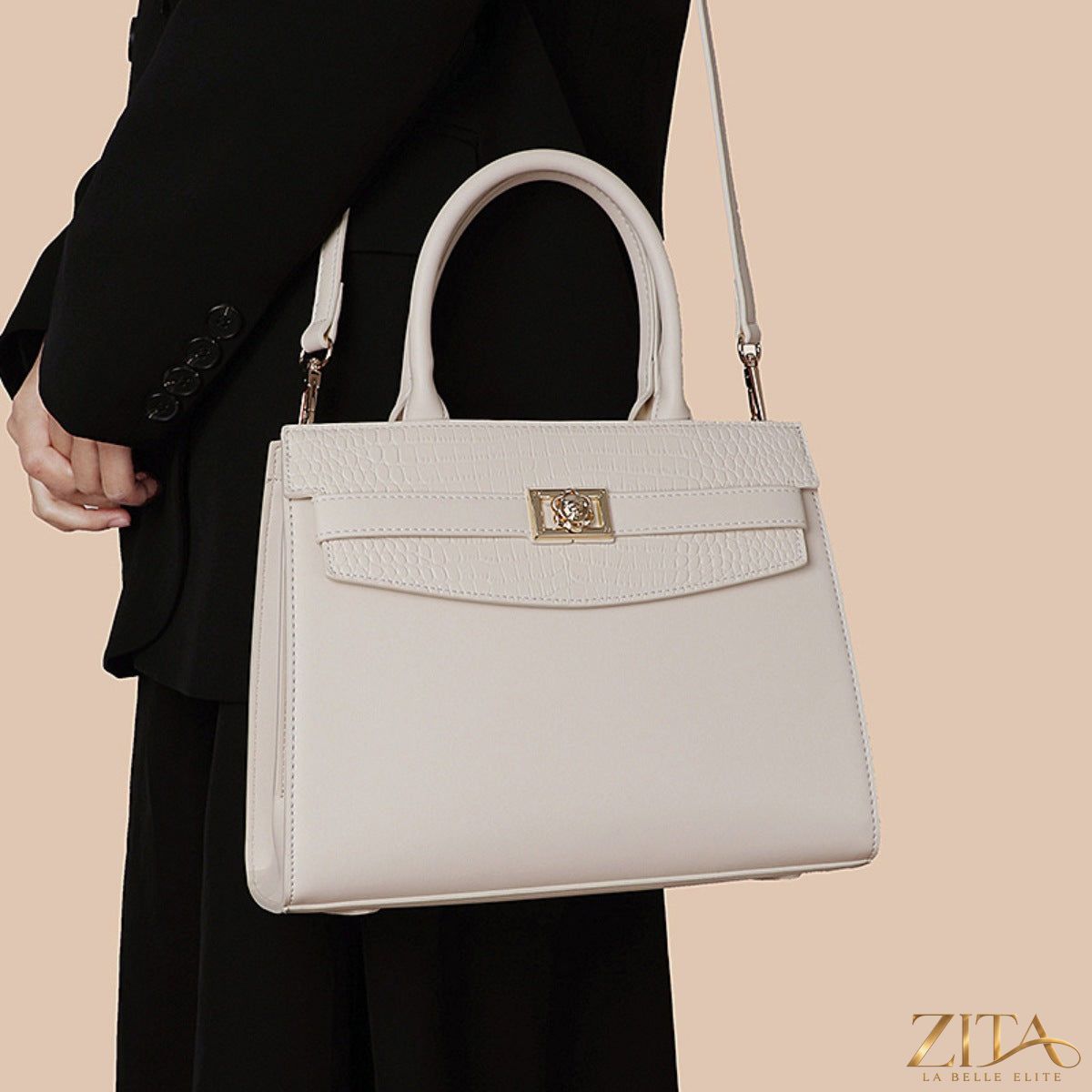 Zita La Belle Elite top handle leather handbag with sleek design, featuring a structured silhouette and elegant leather finish.