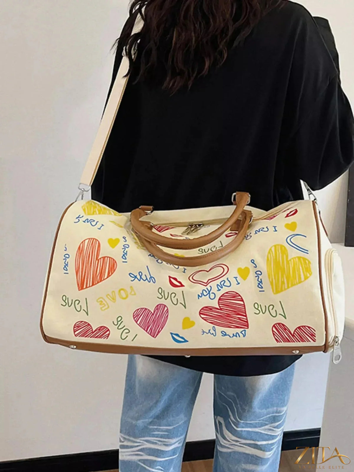 Printed Zita La Belle Elite duffel bag with adjustable strap, showcasing a spacious design and stylish pattern.