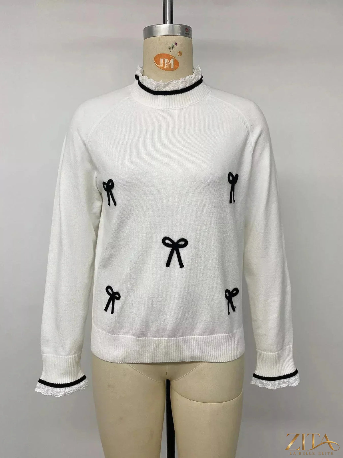 Zita La Belle Elite lace trim sweater with bow embellishments, featuring delicate lace details and a cozy knit design.