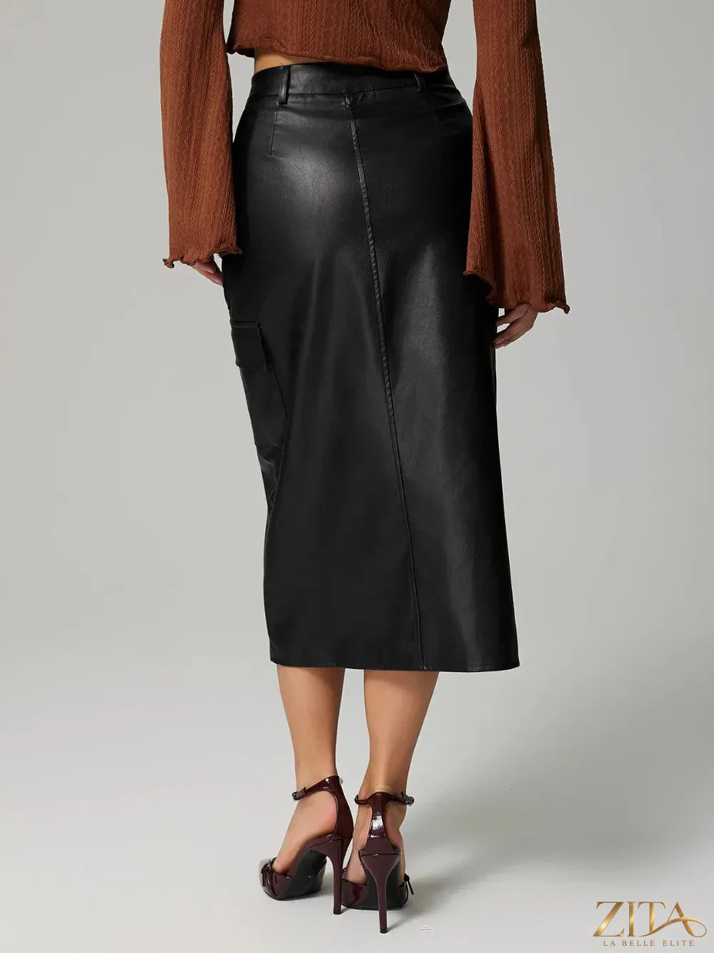 Trendsi slit midi skirt with pockets, featuring a stylish design and side slit, made from lightweight fabric perfect for casual wear.