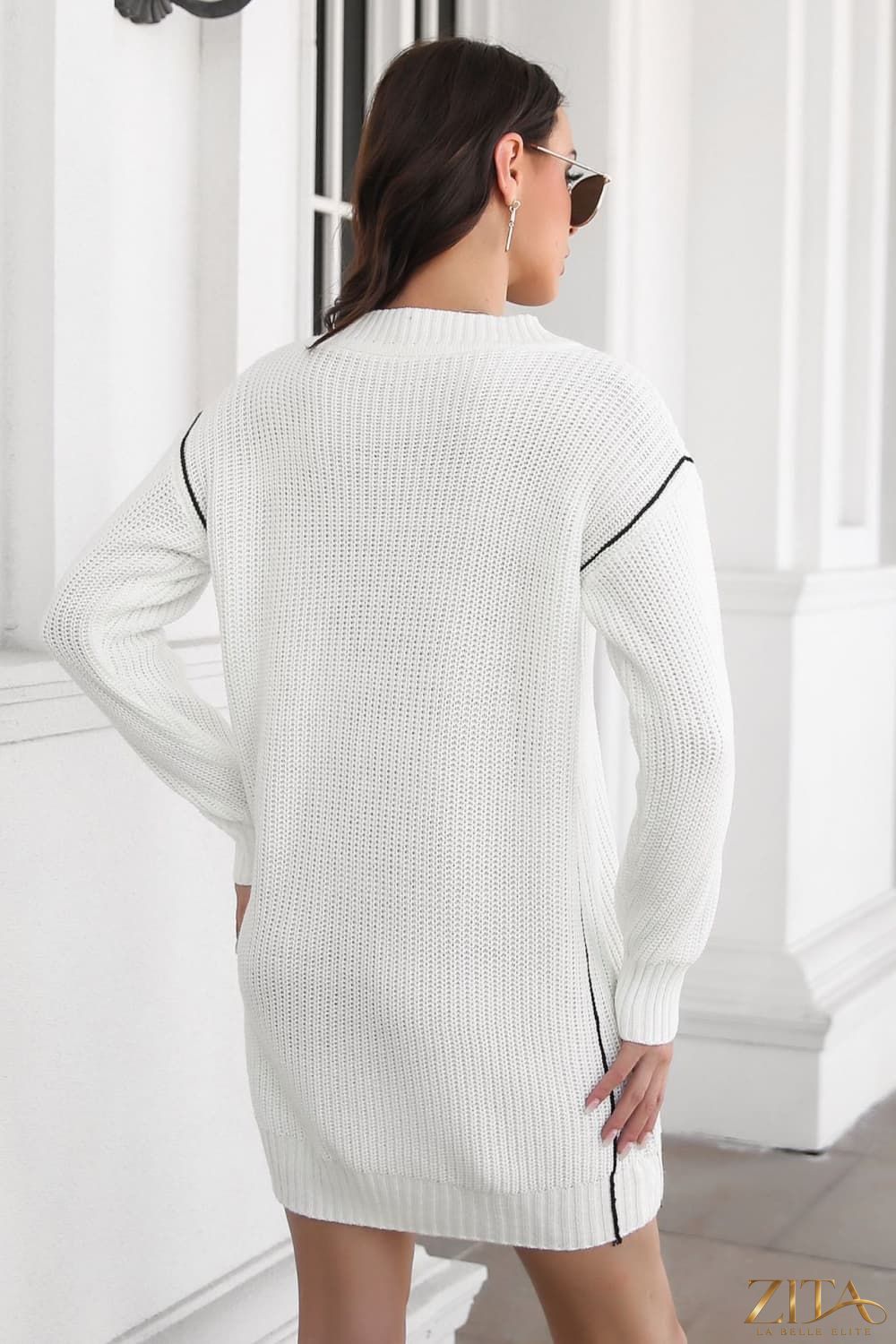 Contrast V-neck sweater dress from Trendsi featuring a cozy knit fabric, long sleeves, and a stylish V-shaped neckline.