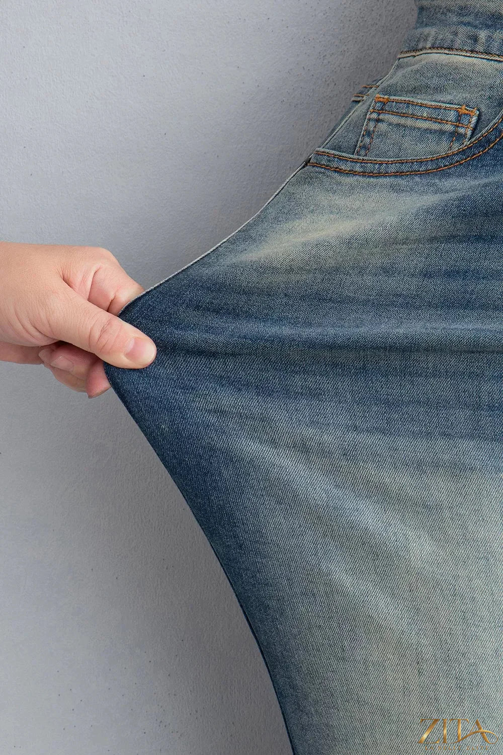 Zita La Belle Elite pocket detail flare leg jeans with high-rise fit and classic denim wash, showcased on a model.