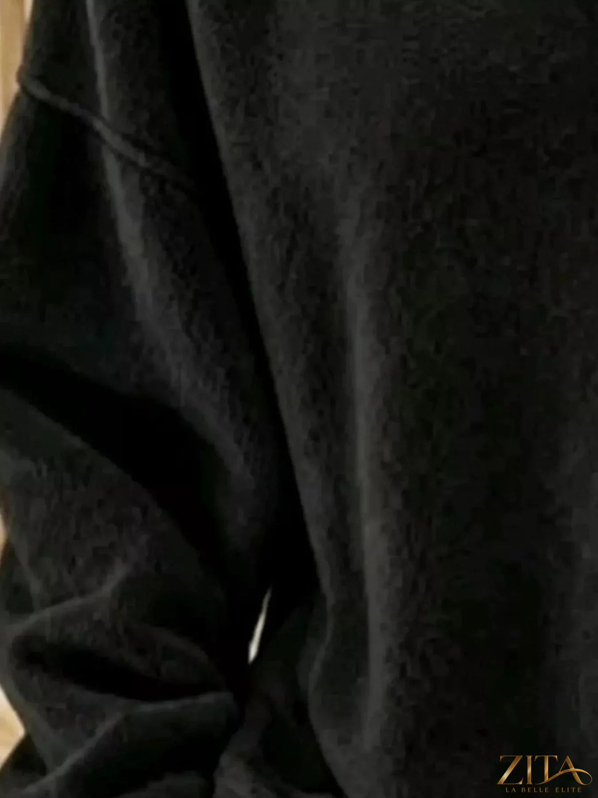 Zita La Belle Elite button detail dropped shoulder sweatshirt featuring a relaxed fit and stylish shoulder design.