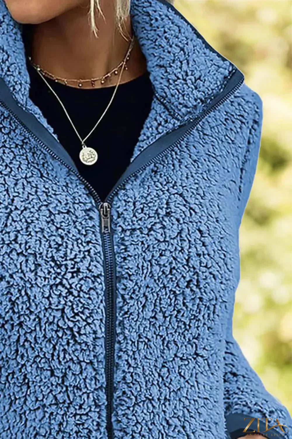 Trendsi pocketed zip-up turtleneck jacket in black, featuring a high neckline and front pockets, casual and cozy outerwear.