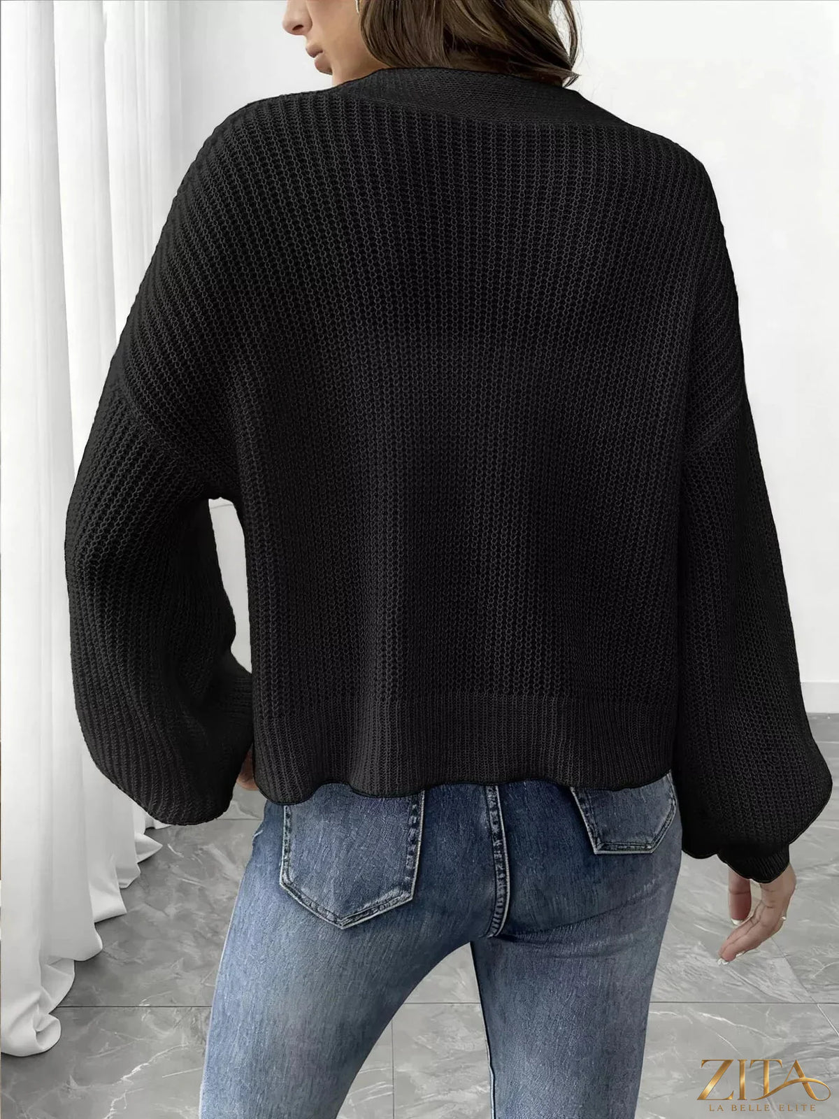 Elegant V-neck button-down ribbed knit cardigan by Zita La Belle Elite, featuring a fitted design and classic button details.