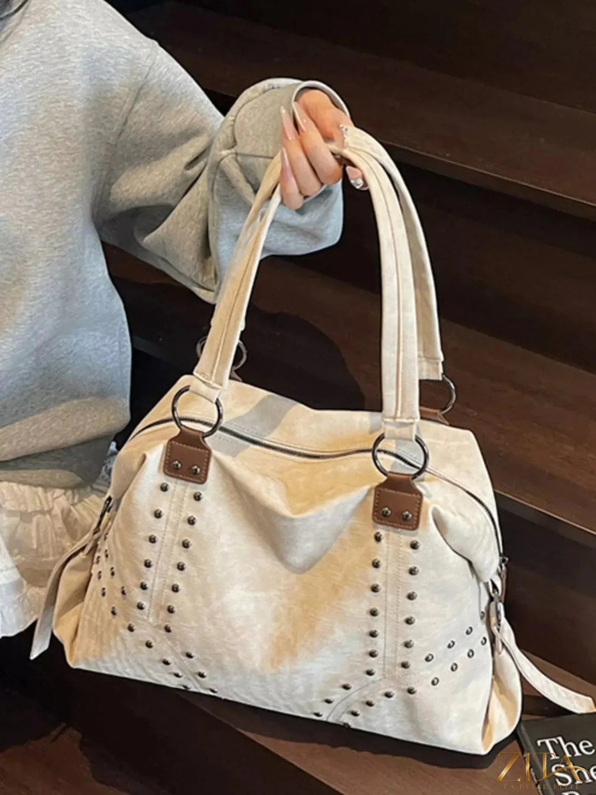Zita La Belle Elite studded vintage-style handbag with leather exterior and metal stud details, stylish and compact for everyday use.