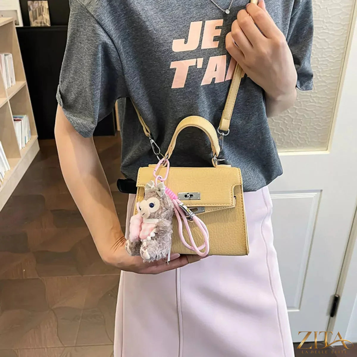 Trendsi PU leather handbag with structured design, top handle, and silver hardware, perfect for stylish everyday use.