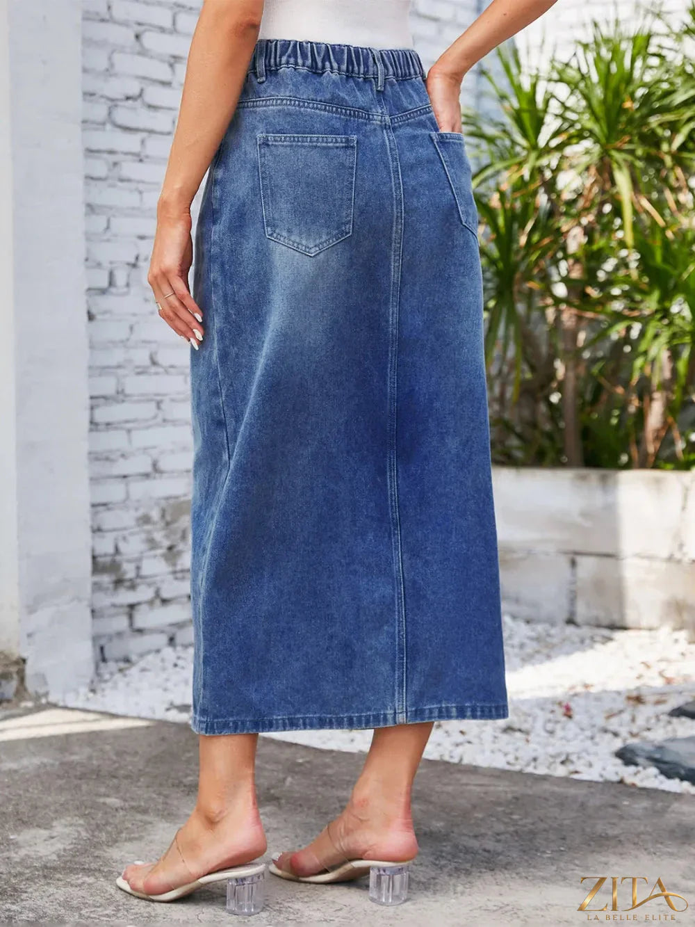 Zita La Belle Elite slit midi denim skirt with pockets, featuring a stylish slit design and functional front and back pockets.