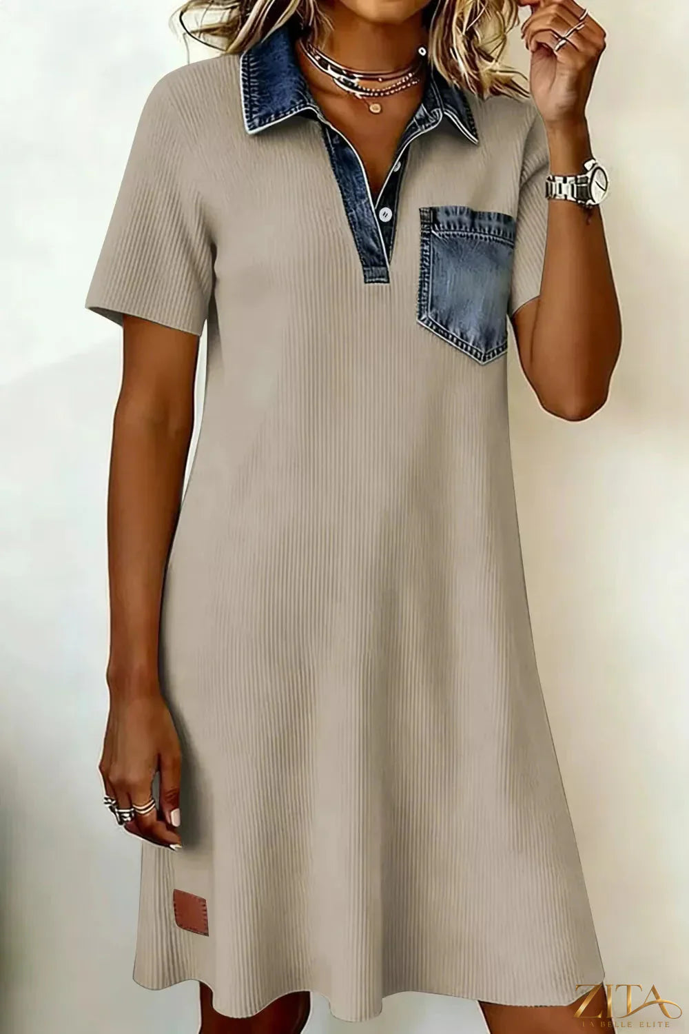 Casual ribbed knit mini dress with denim trim from Zita La Belle Elite, featuring a fitted silhouette and short sleeves.
