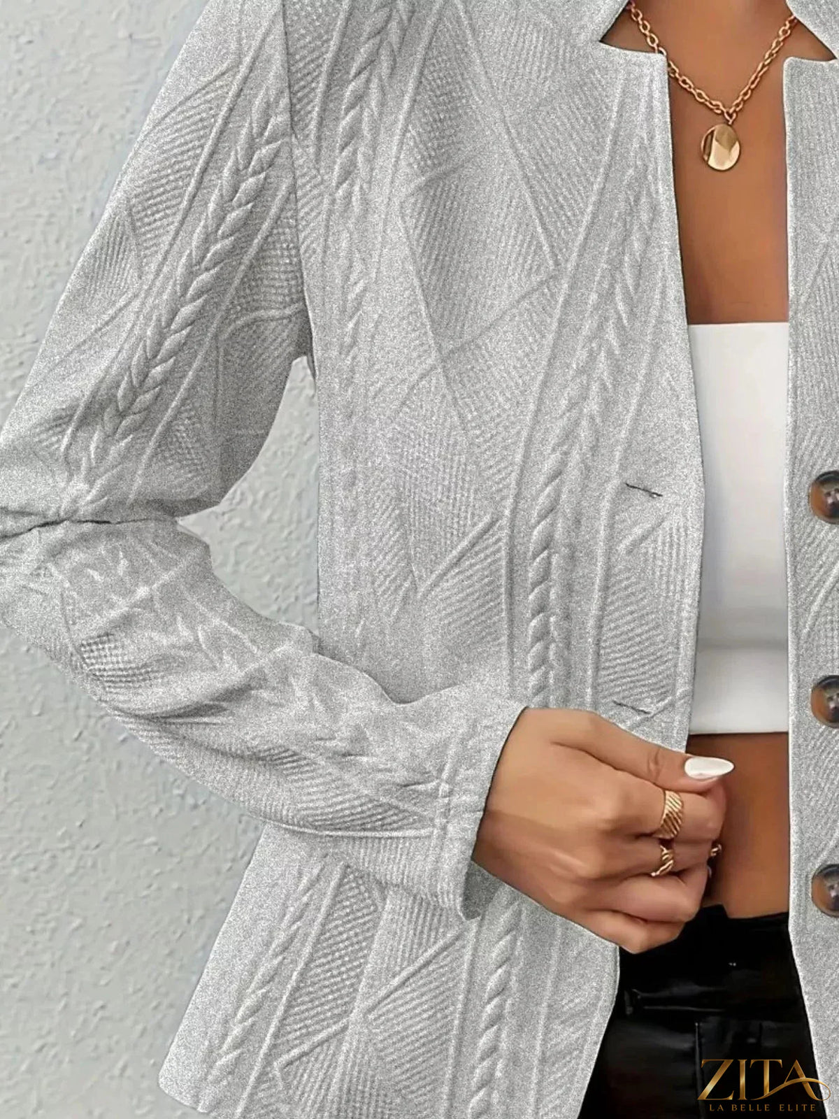 Textured knit button-front blazer by Zita La Belle Elite, shown in close-up with detailed fabric and tailored fit.