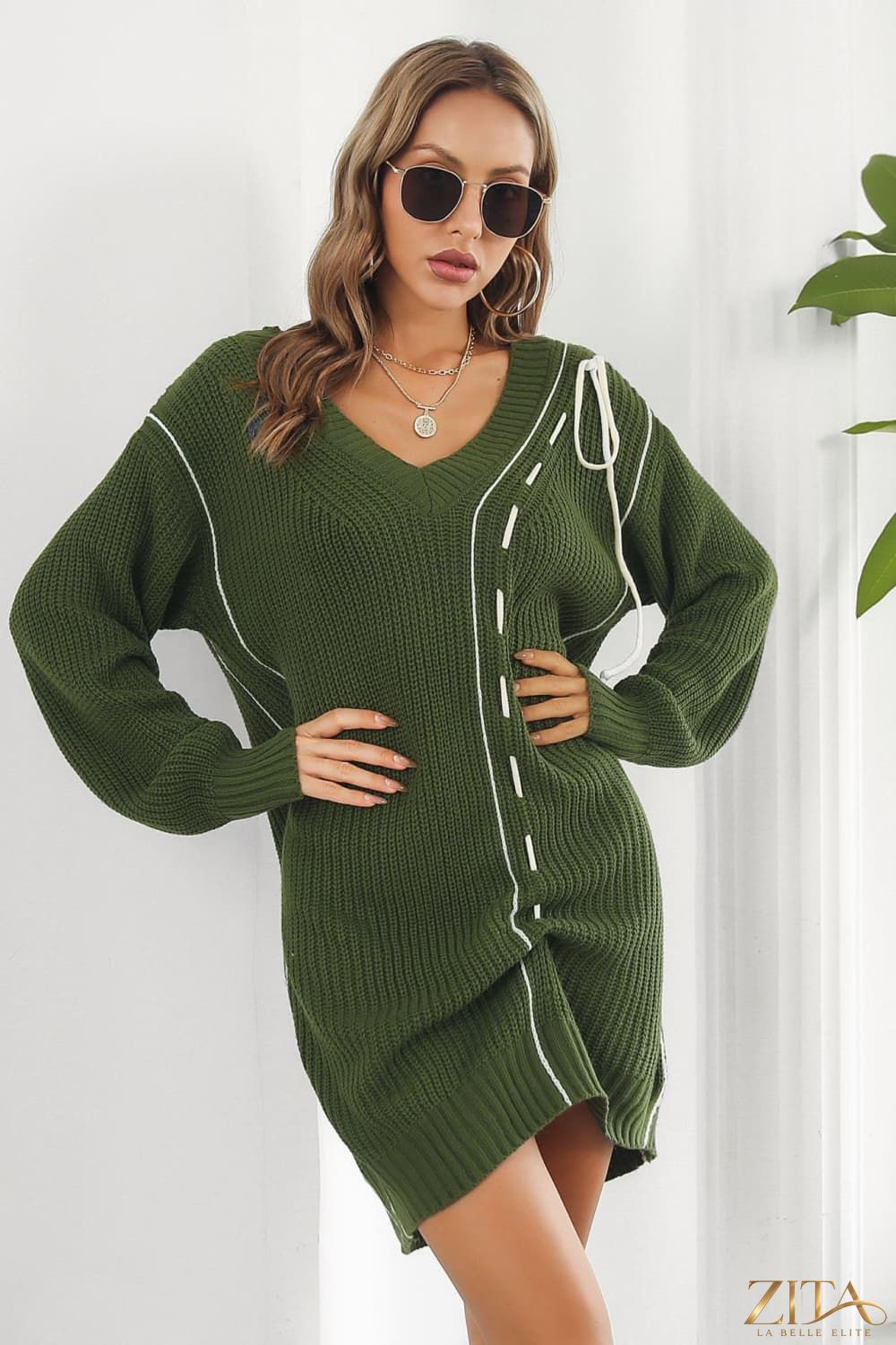 Contrast V-neck sweater dress by Trendsi featuring a stylish V-neckline, fitted silhouette, and contrasting color details.