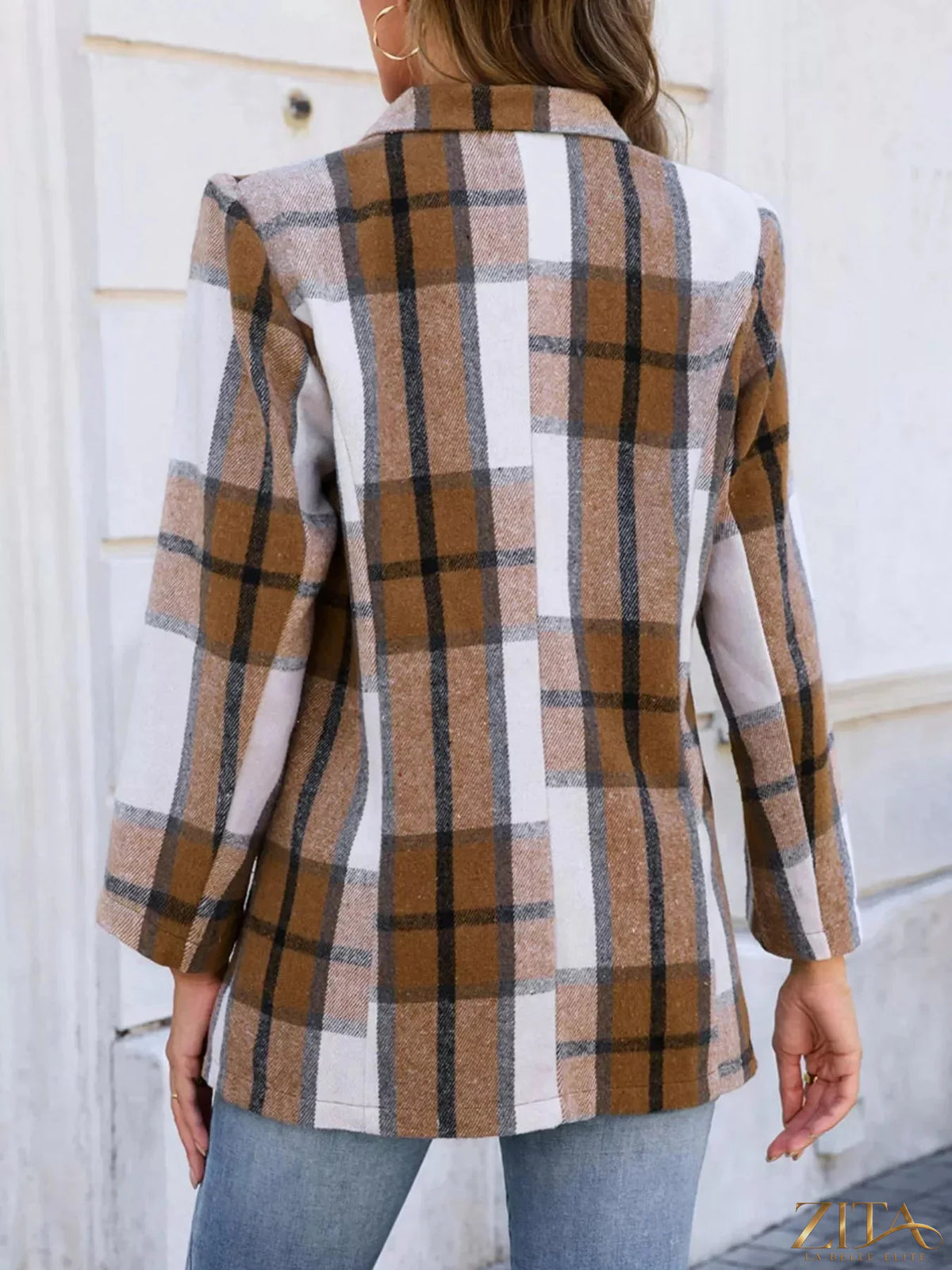 Plaid double-breasted blazer from Trendsi featuring a classic pattern, tailored fit, and stylish lapels.