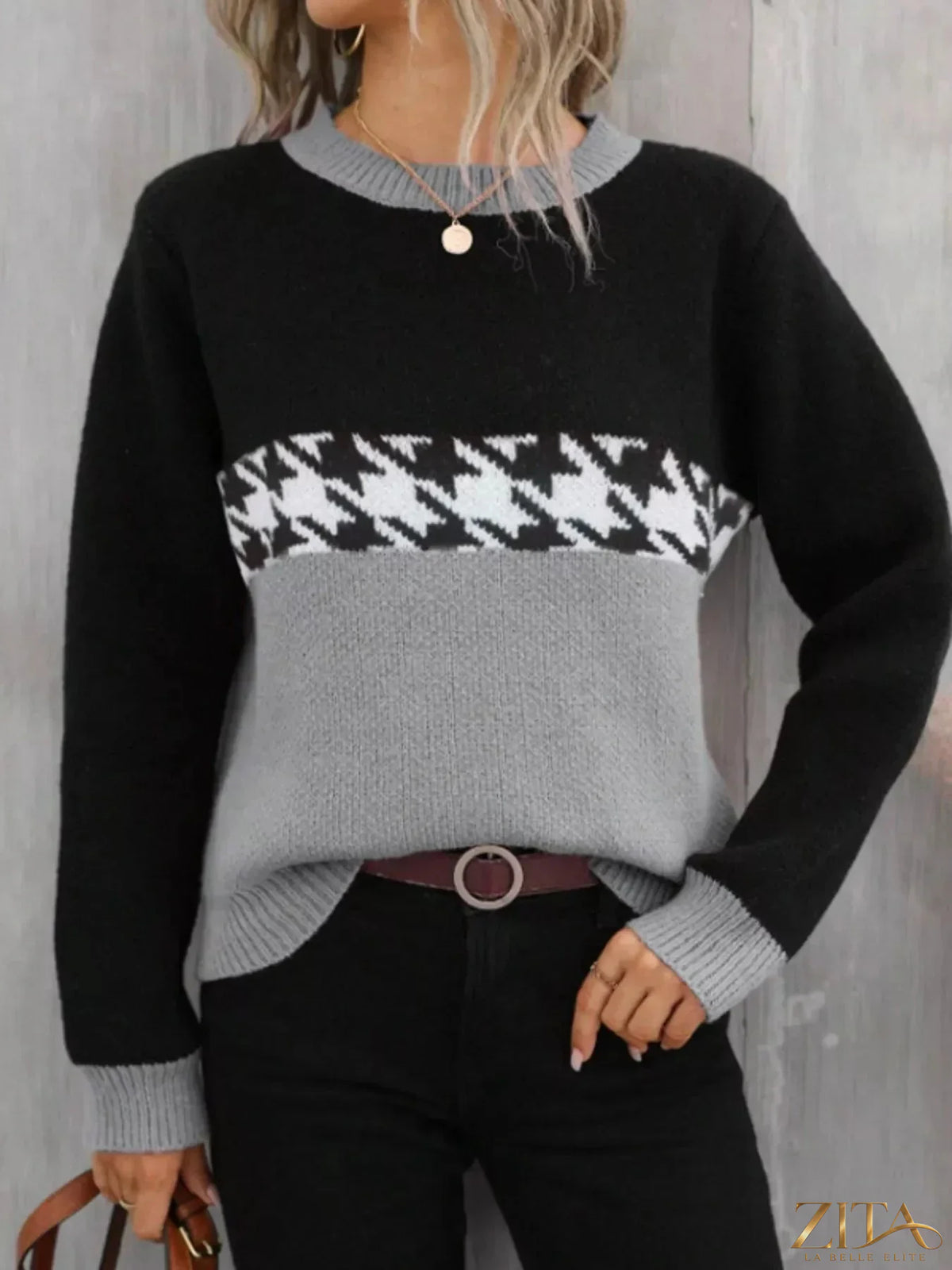 Color block houndstooth sweater by Trendsi featuring a stylish black and white pattern and cozy knit fabric.