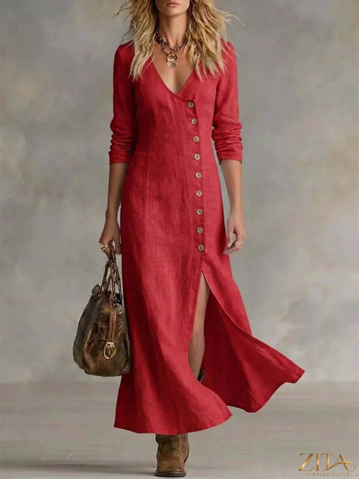 Zita La Belle Elite slit button-down midi dress in flowy fabric with a front slit and long sleeves, displayed on a hanger.