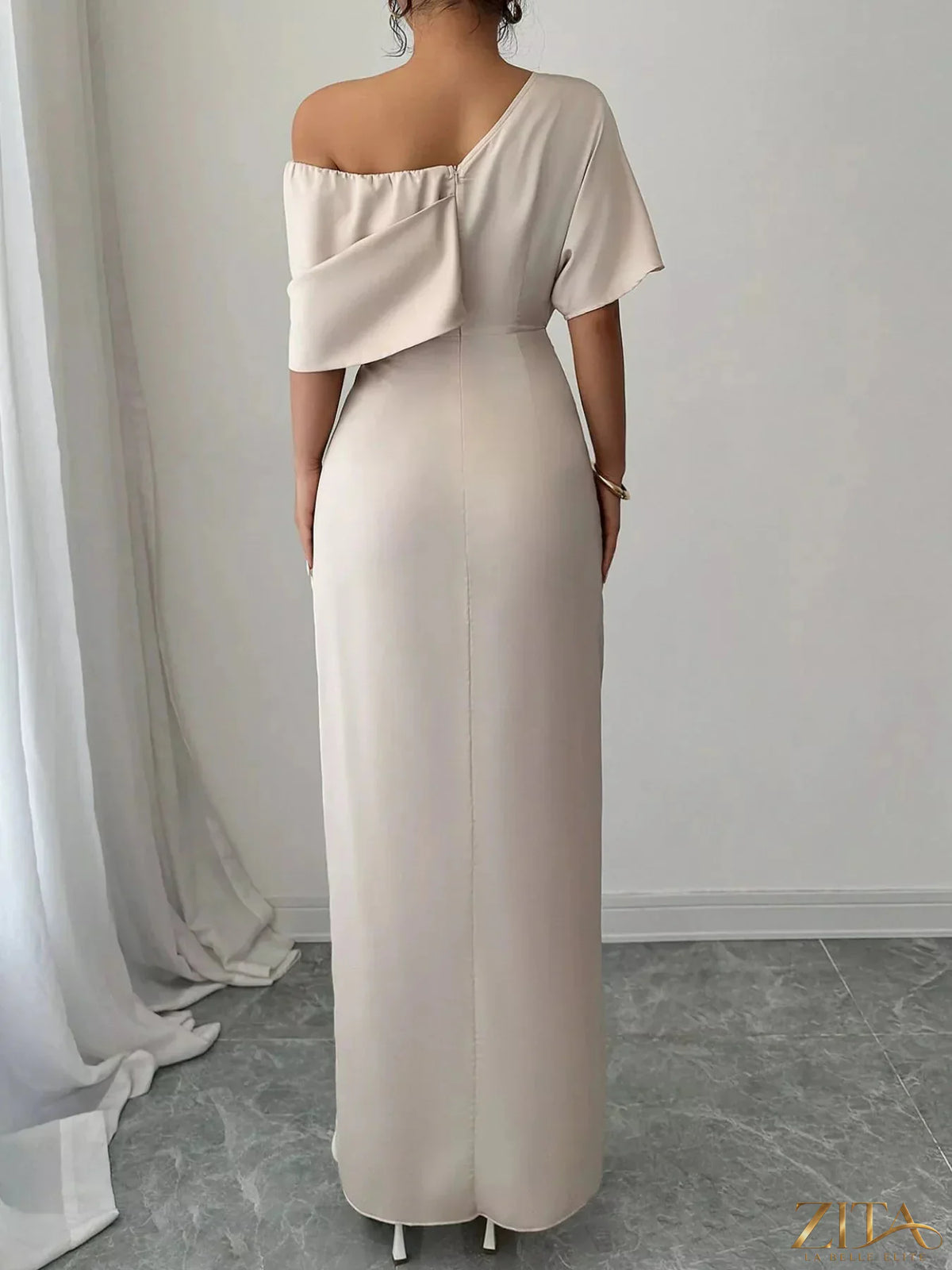 Elegant one-shoulder satin maxi dress by Trendsi, featuring a flowing silhouette and smooth satin fabric.