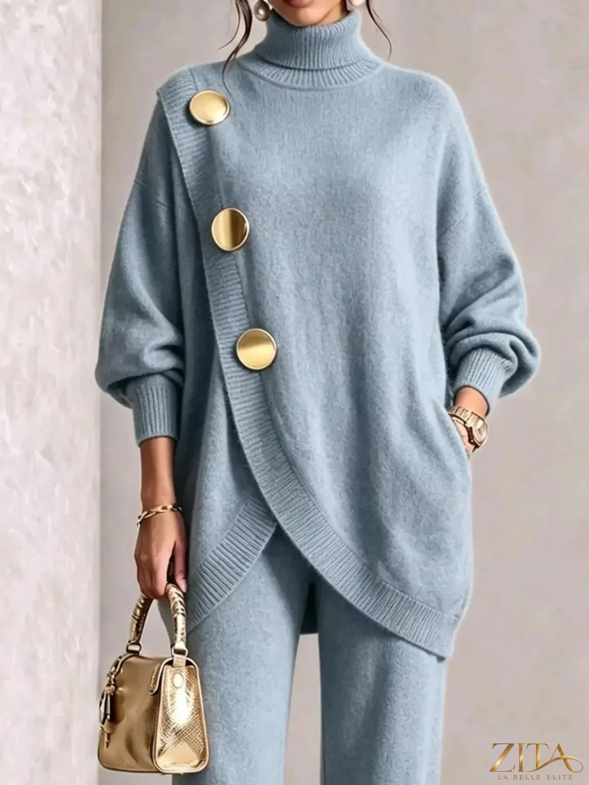 Gold button accent turtleneck sweater and matching pants set by Trendsi, featuring a cozy knit fabric and stylish gold button details.