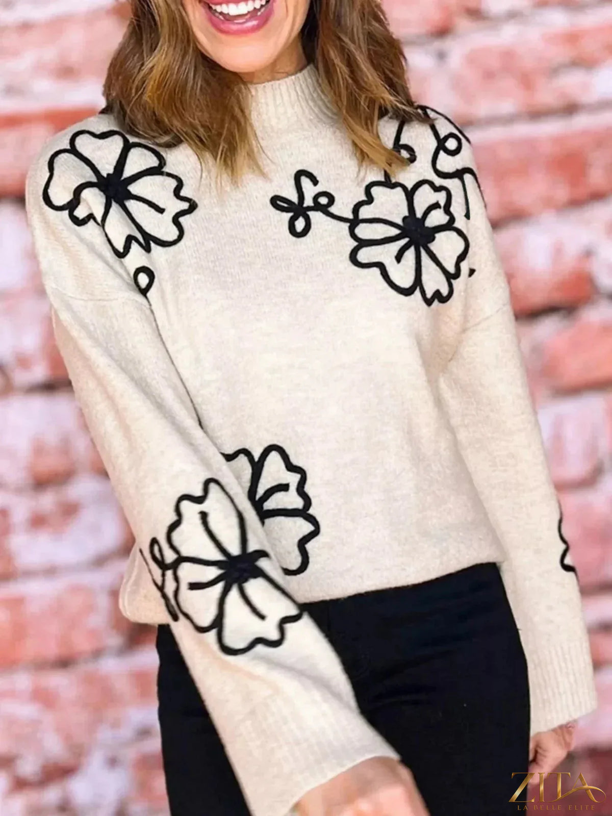 Zita La Belle Elite flower-stitched mock neck sweater featuring floral embroidery and ribbed cuffs in a soft knit fabric