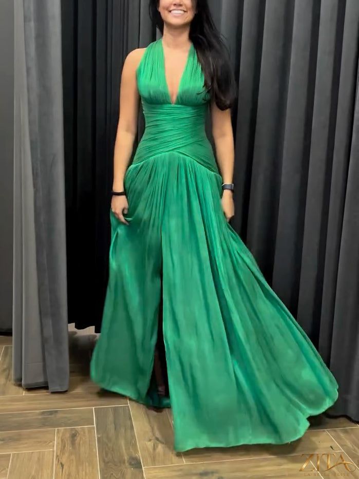Emerald green Zita La Belle Elite gown with plunging neckline, pleated skirt, and side slit, elegant evening dress.
