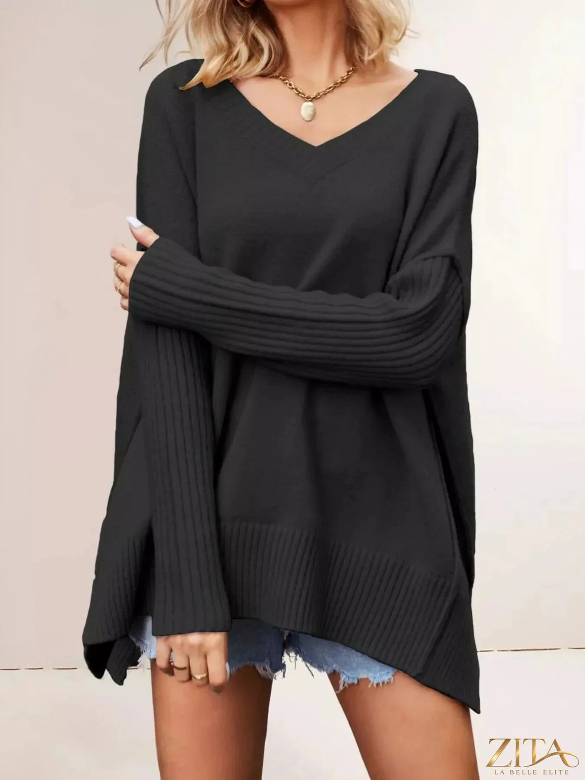 Zita La Belle Elite V-neck ribbed sweater with long sleeves, soft knit fabric, and a fitted silhouette.