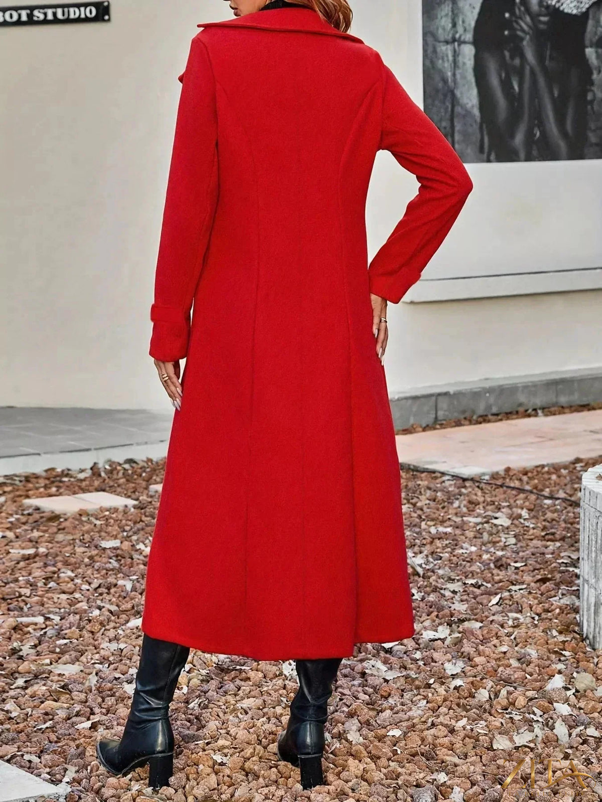 Zita La Belle Elite double-breasted longline coat displayed on a hanger, featuring a tailored fit and classic lapel design.