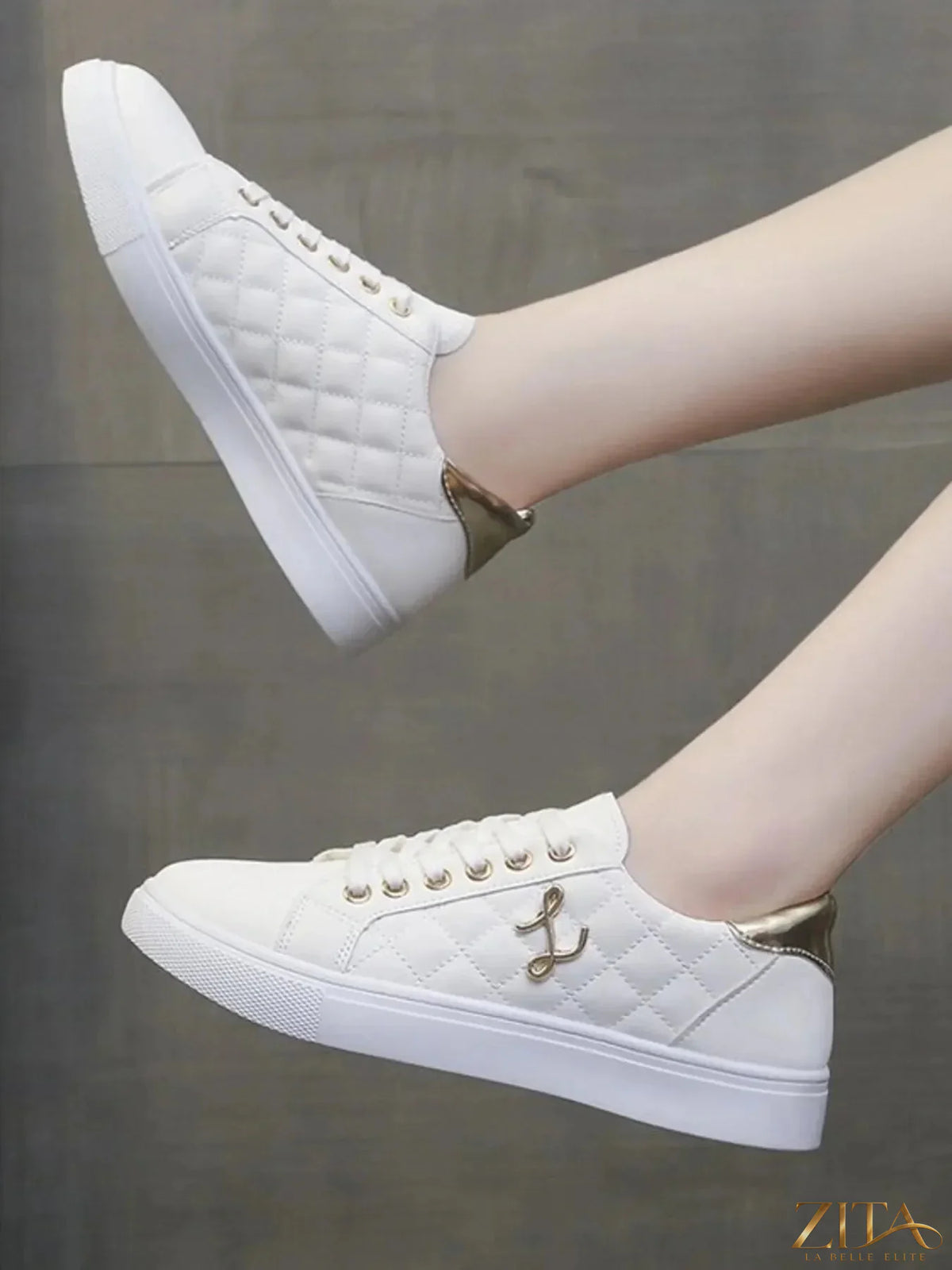 Zita La Belle Elite quilted platform sneakers with metallic gold accents, stylish footwear with textured quilting and shiny gold details.