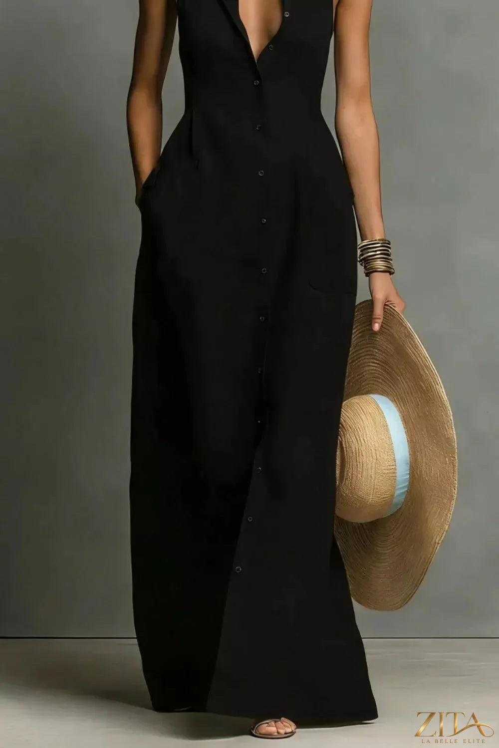 Zita La Belle Elite sleeveless button-down maxi dress in flowing fabric, displayed hanging on a white background.