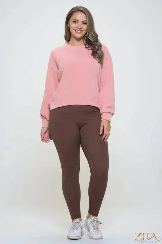 Yelete high waisted fleece-lined leggings in black, showing the snug fit and soft, warm interior perfect for cold weather.