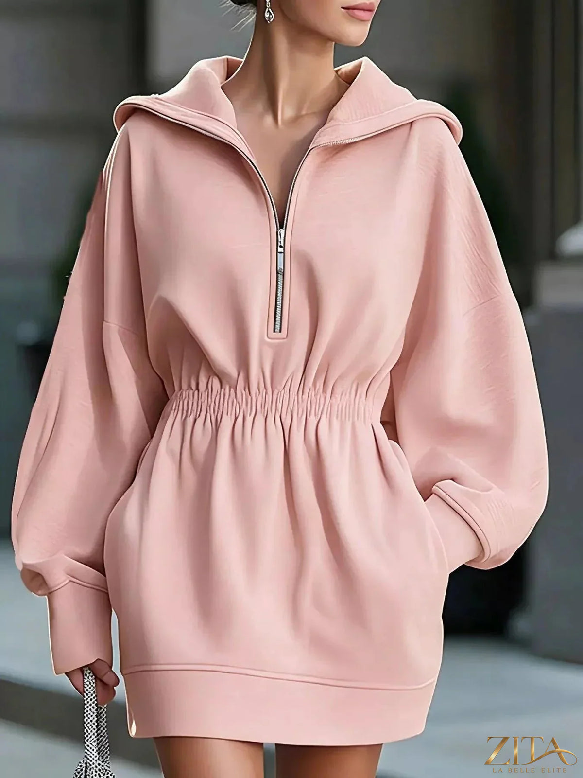 Zita La Belle Elite casual hooded quarter-zip sweatshirt dress with a relaxed fit and soft fabric, displayed on a hanger.