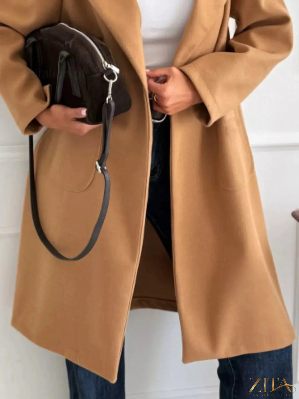 Zita La Belle Elite long-sleeve single-breasted trench coat in beige, showing classic collar and waist belt detail.
