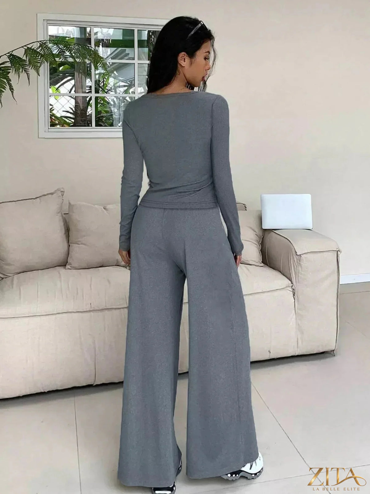 Zita La Belle Elite button-down top and wide-leg pants set displayed on a model, featuring a stylish, coordinated outfit.