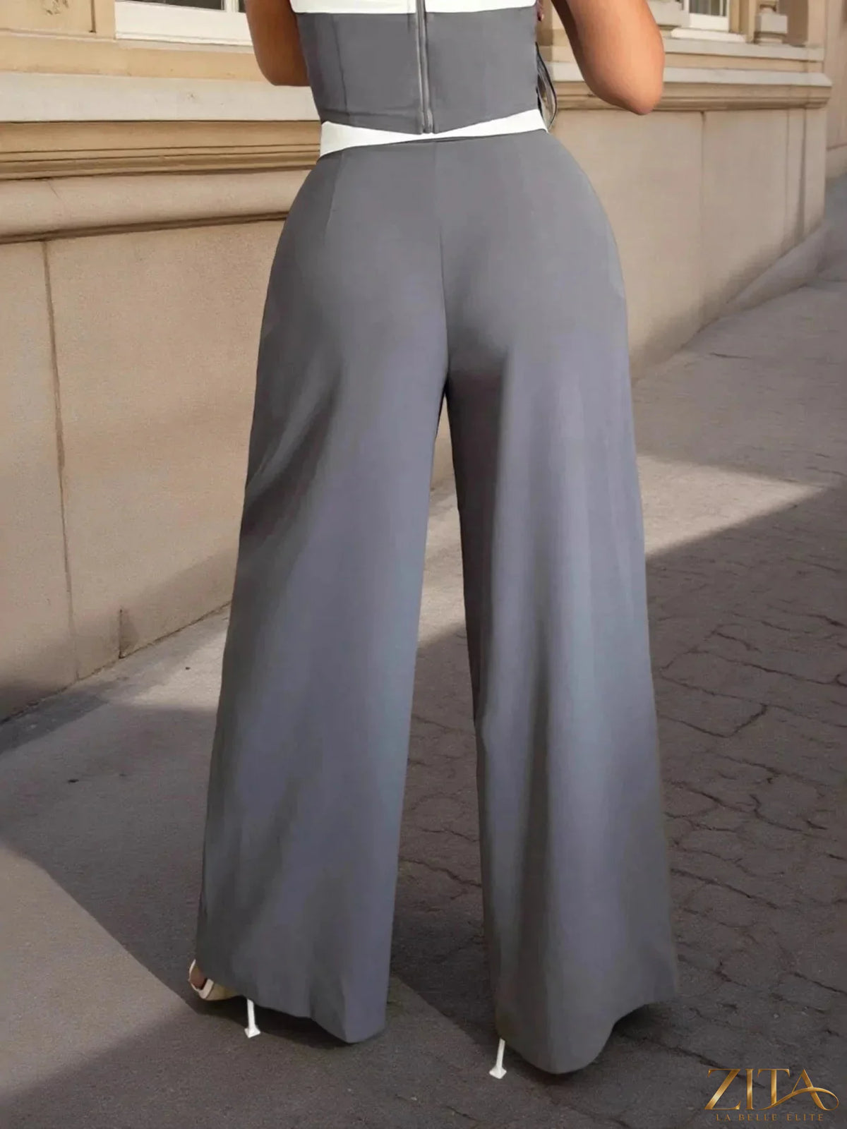 Zita La Belle Elite wide leg pants in neutral fabric, showcasing relaxed fit and flowing silhouette on a model.