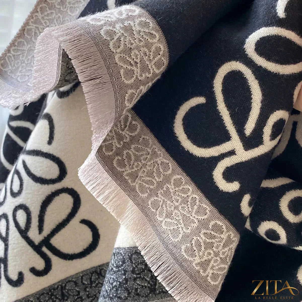 Zita La Belle Elite raw hem winter scarf in cozy knit fabric, featuring a stylish raw edge design for warmth and fashion.