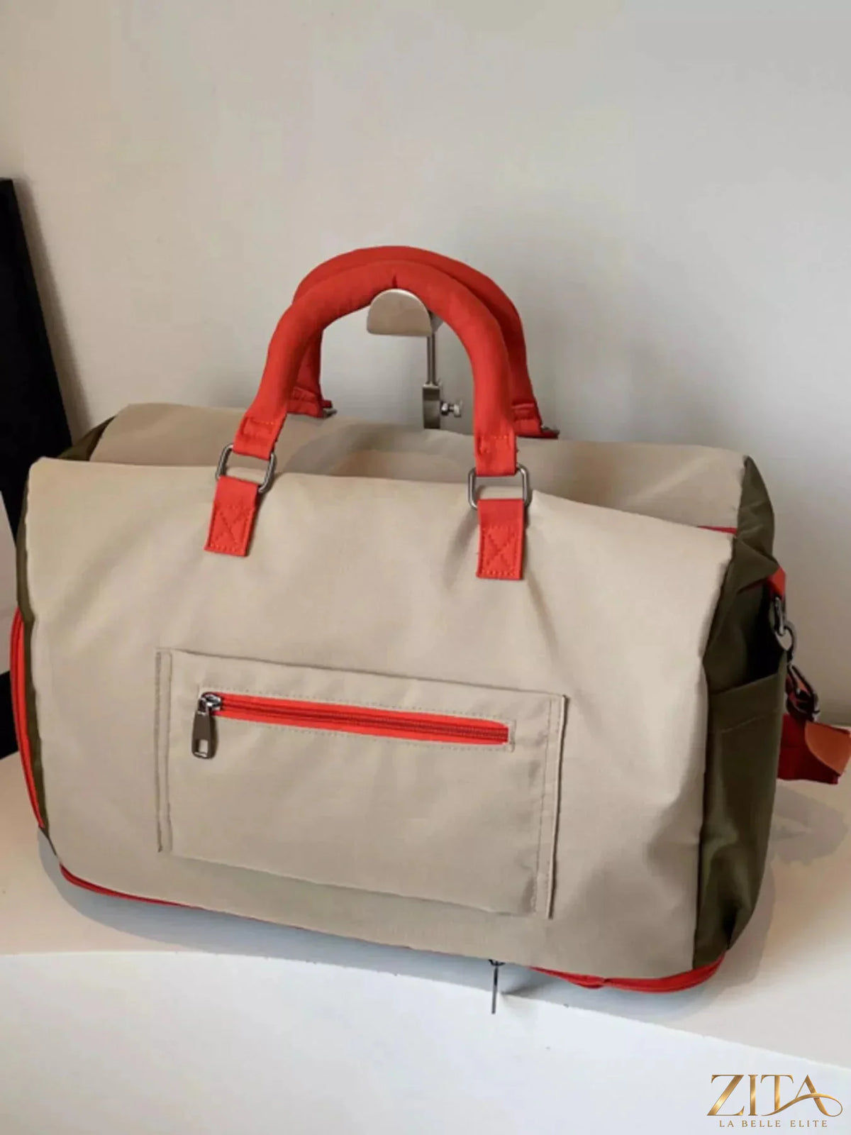 Zita La Belle Elite plaid travel bag with detachable strap, featuring a classic checkered pattern and sturdy handles.