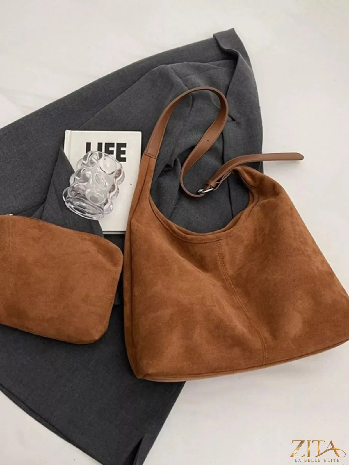 Lightweight Zita La Belle Elite adjustable strap handbag with sleek design and metal hardware, shown with open top and interior view.