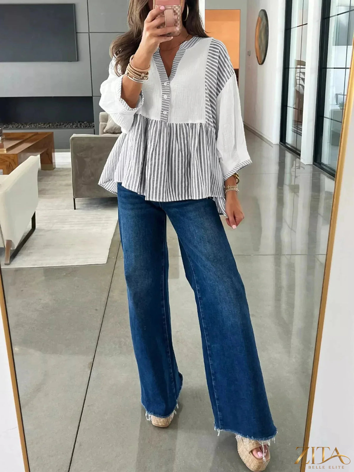 Zita La Belle Elite striped button detail blouse featuring vertical stripes and a classic button-up design.