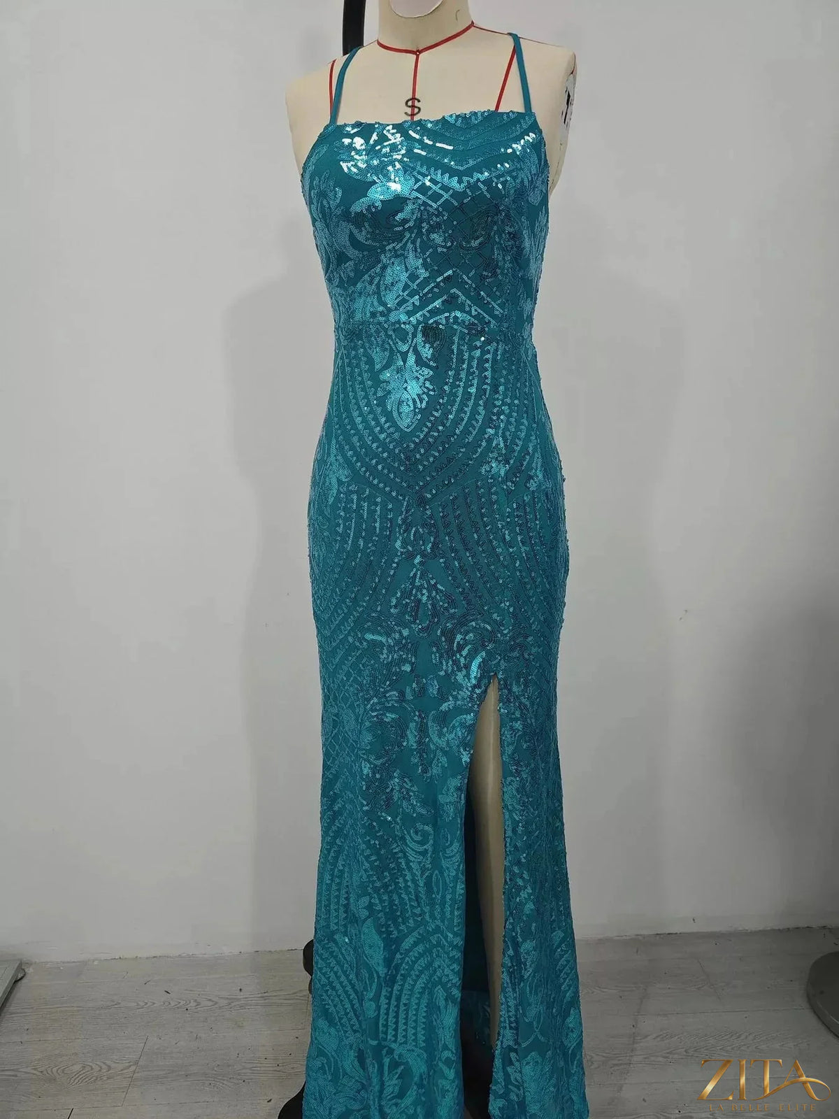 Sequin embellished backless bodycon evening dress with lace-up back by Zita La Belle Elite, featuring elegant fit and sparkling details.