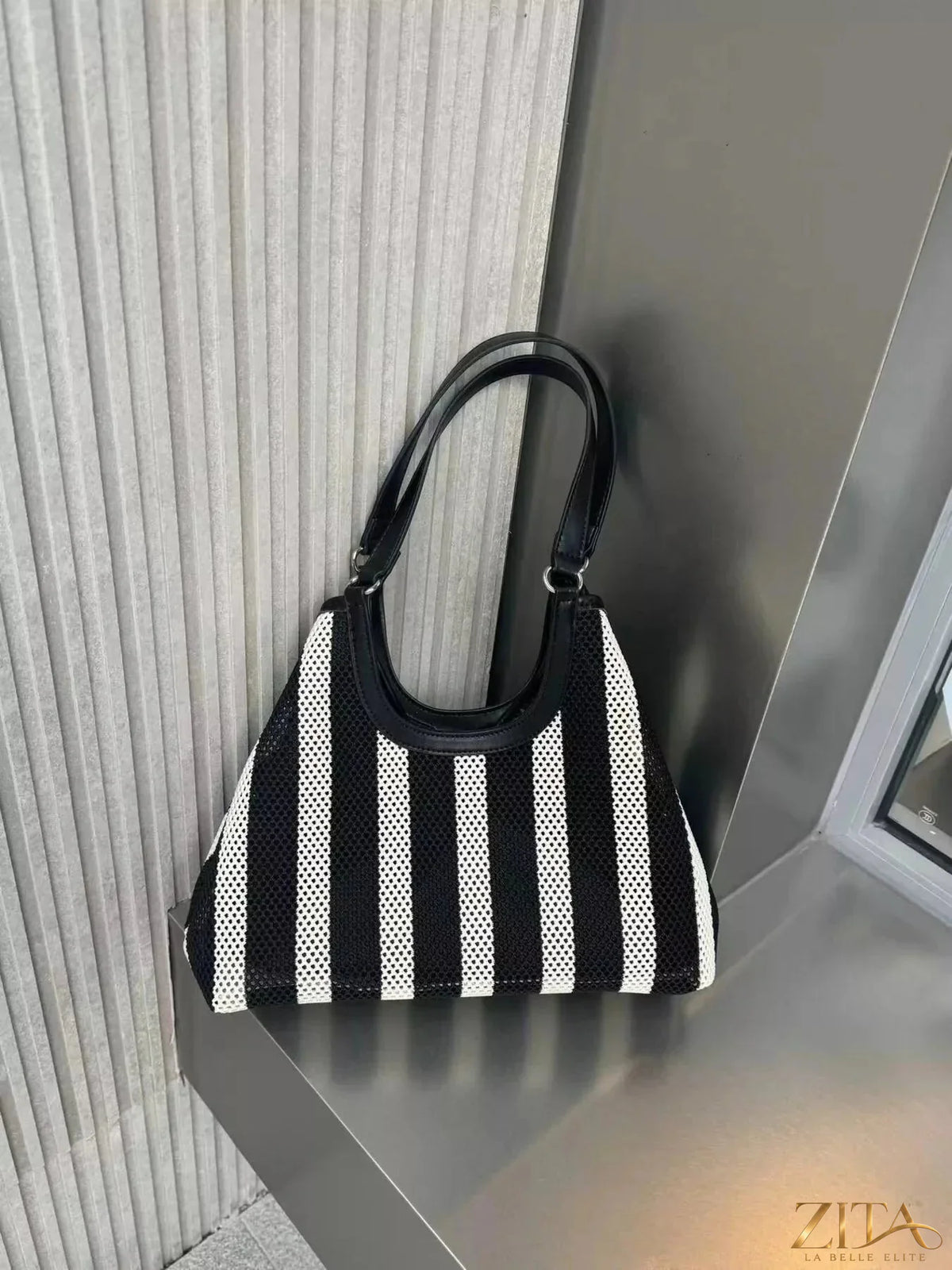 Contrast striped tote bag by Zita La Belle Elite, featuring durable fabric with navy and white stripes, suitable for everyday use.