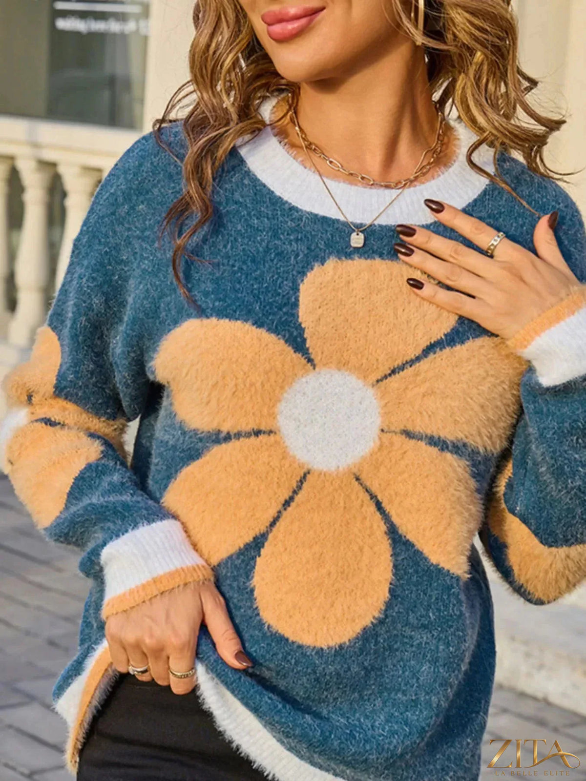 Zita La Belle Elite flower print round neck sweater in soft knit fabric, featuring a floral design and ribbed cuffs.